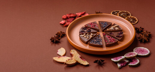 Craft home made chocolate with berries and fruits, delicious sweets. Craft chocolate
