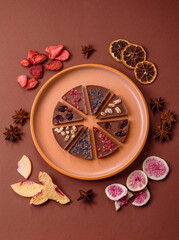 Craft home made chocolate with berries and fruits, delicious sweets. Craft chocolate