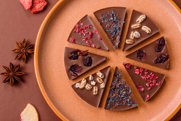 Craft home made chocolate with berries and fruits, delicious sweets. Craft chocolate