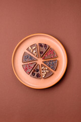 Craft home made chocolate with berries and fruits, delicious sweets. Craft chocolate