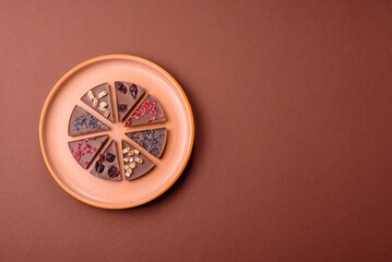 Craft home made chocolate with berries and fruits, delicious sweets. Craft chocolate