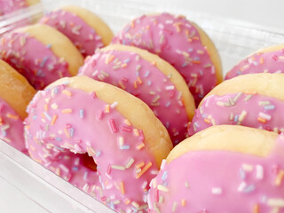 Bright Pink Glazed Donuts in Box