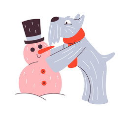 Christmas dog making snowman outdoors