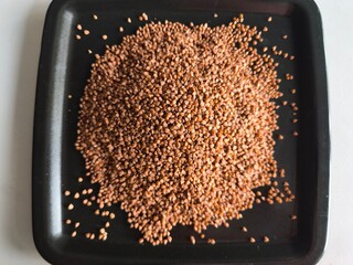 Buckwheat, superfood, healthy vegetarian food. Dry grits. Grains. Close-up