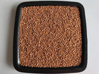 Buckwheat, superfood, healthy vegetarian food. Dry grits. Grains. Close-up Top view 