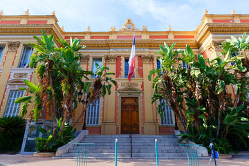 The beautiful historic facade of the town hall in Menton , South France.