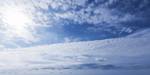 Blue Sky with Scattered Clouds on a Clear Sunny Day