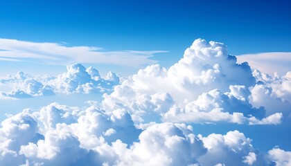 Aerial view with fluffy clouds, and blue sky.