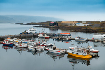 Boat in the fishing village of Djupivogur outside the Bulandsnes Peninsula in the Eastfjords. The...