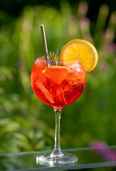 glass of classic red spritz cocktail