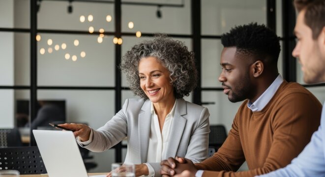 Diverse business professionals collaborating effectively in a modern office setting