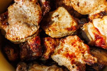 Macro photography of juicy barbecue meat with crispy seared edges