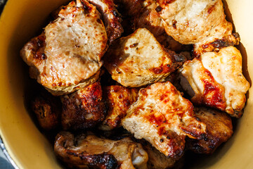 Macro photography of juicy barbecue meat with crispy seared edges