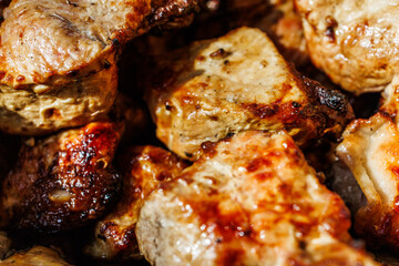 Macro photography of juicy barbecue meat with crispy seared edges