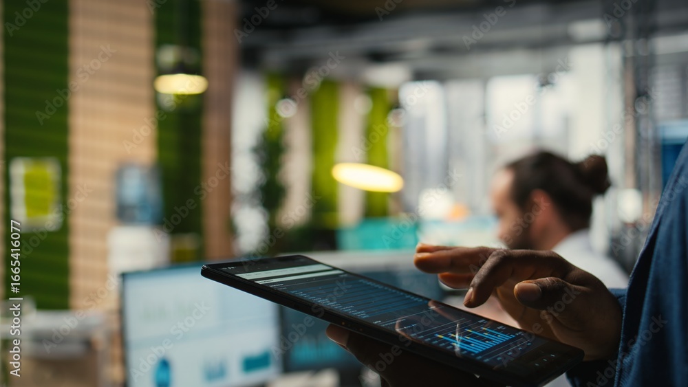 Poster close up of man reviews performance metrics insights on tablet, driving business strategy and innova