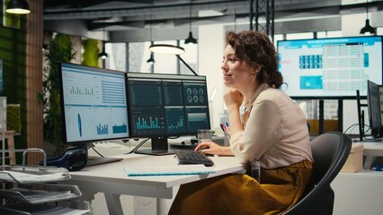 Woman advisor engages in brainstorming sessions and data forecasting, leveraging insights and...