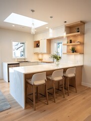 Modern, bright kitchen with white cabinets, light wood accents, and a large island