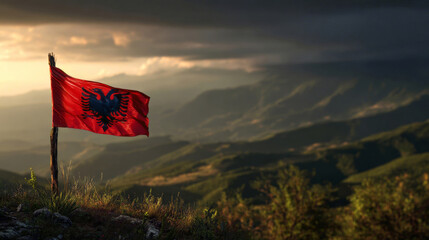 Albanian flag proudly waving in the wind celebrating Independence Day and Flag Day against a mountainous backdrop