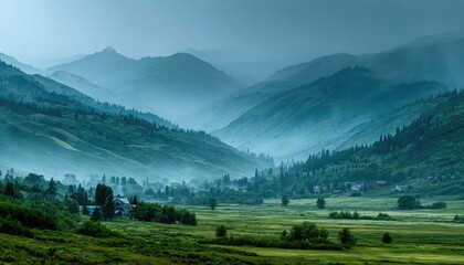 Obraz premium Misty valley nestled in a mountain range