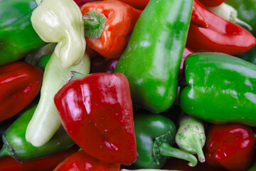 Yellow, green, red and purple chillies