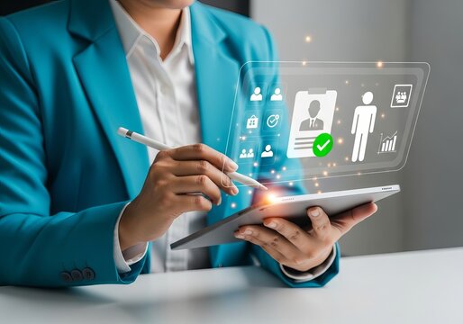 A businesswoman in a turquoise blazer interacts with a digital tablet, showcasing virtual data and analytics.