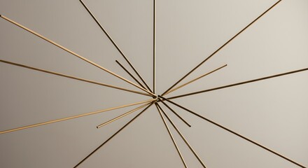 Abstract starburst design with radiating gold lines from a central point, modern decorative lighting fixture