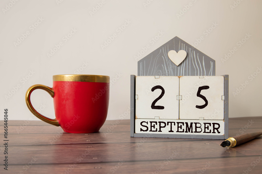 Poster september 25, save the date with number cube design for background.