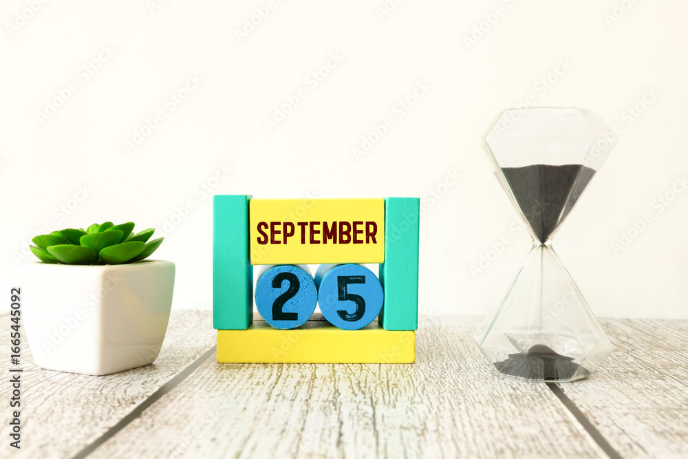 Poster september 25, save the date with number cube design for background.