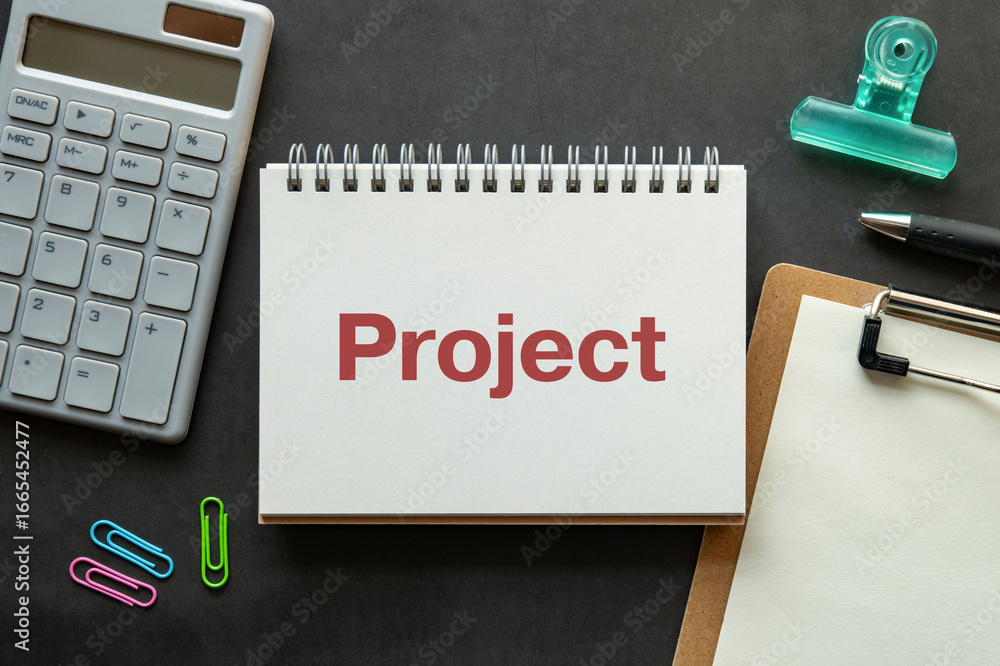 Aufkleber there is notebook with the word project. it is as an eye-catching image.