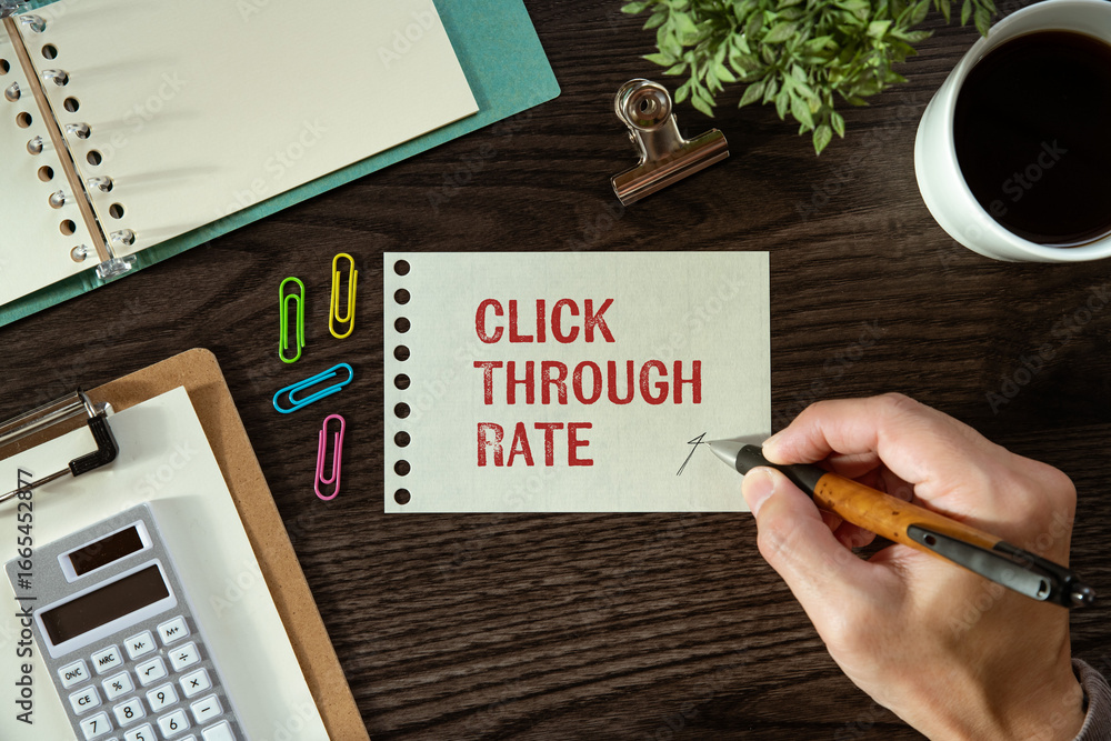 Aufkleber there is notebook with the word click through rate. it is as an eye-catching image.