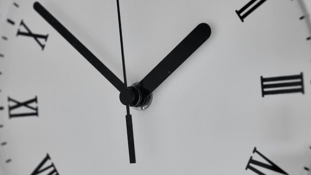 Clock dial. Fast movement. Minute and hour hand movement.Clock dial with running hands and Roman numerals. Fast motion video.Running of time concept. Time flies. 4k footage