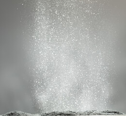 Wallpaper Background of silver diamond glitter powder sand creating abstract bokeh festive sparkle. Bokeh particle element of silver diamond glitter sand light up luxury balance background