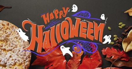 Happy Halloween text image over autumn leaves and pumpkin pie