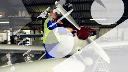 Aviation technician lifting cover and inspecting blades while overlays guiding preflight inspection