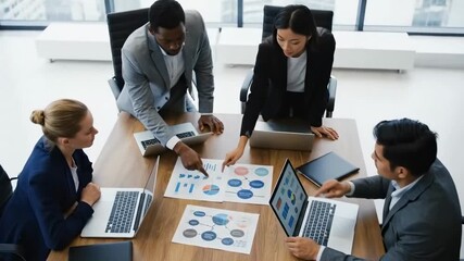 Boardroom meeting of high-level sales and marketing team that discuss future business enterprise strategy