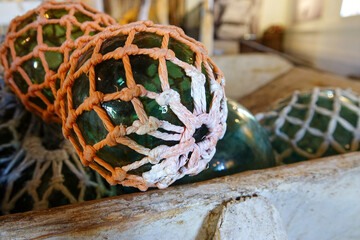 Vintage Glass Fishing Floats in Rope Nets – Traditional Maritime Heritage and Coastal Decor from Historic Nordic Fishing Villages, Nautical Collection and Ocean-Inspired Fishing Equipment © Amanda