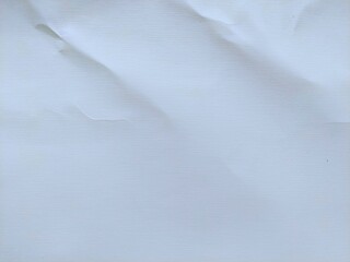 White crumpled paper texture with natural wrinkles and old dents. Abstract crumpled paper worn background for design projects.