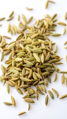 Dried fennel seeds on white background