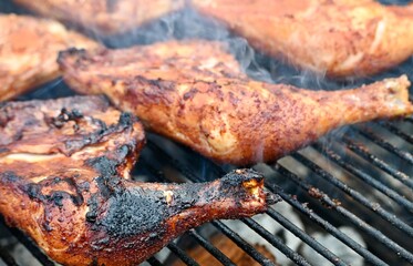 Chicken quarters on the grill