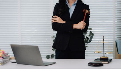 Attractive young lawyer in office Business woman and lawyers discussing contract papers with brass...