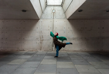 Young ballerina dancing in an underground station in Stuttgart city