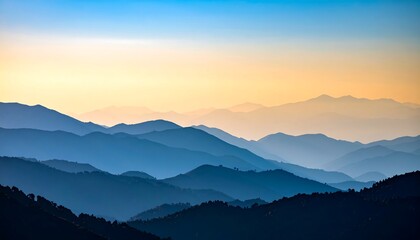 Fototapeta premium Sunset over layered mountain range.