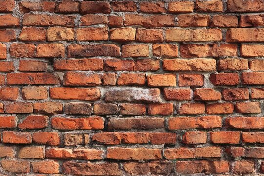 Old brick wall, weathered red bricks - Powered by Adobe