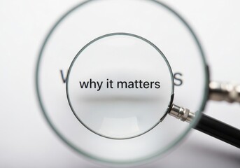 A magnifying glass held over text that reads why it matters, emphasizing the importance of understanding