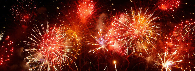 Banner red firework night time celebrate national holiday. Countdown new year 2025 festival with copy space. Banner Red Firework celebrate anniversary happy new year 2026 4th of july holiday festival