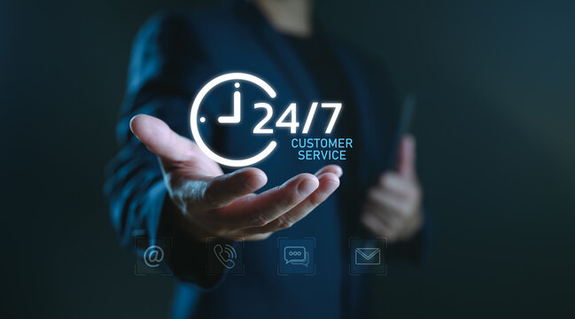 24/7 customer service concept with businessman holding digital clock icon, representing nonstop support, online assistance, client care, business availability, contact center and service reliability.