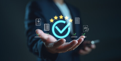 Quality assurance concept with five-star rating and check mark icon in hand, representing approval...