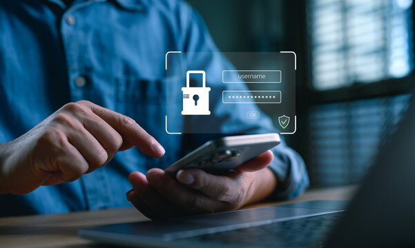 Close-up of a person using smartphone with login interface overlay, symbolizing data privacy, online security, identity protection and cybersecurity authentication access, 2FA.