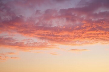 Fototapeta premium Pink sunset cloudscape, evening sky, peaceful background, design element