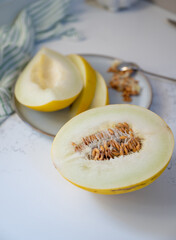 Canary and Snow Leopard Melon on Quartz Counter